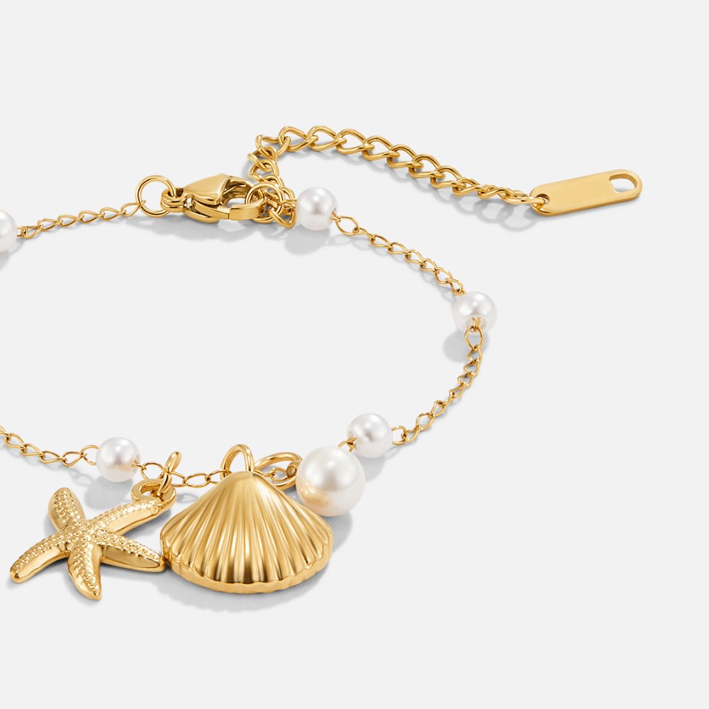 Pulsera con colgantes en forma de concha