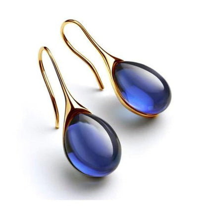 Pendientes de cristal elegantes en forma de gota en oro y plata