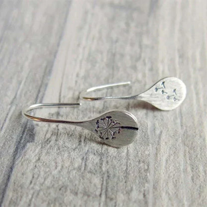 Pendientes vintage de plata con diseño floral