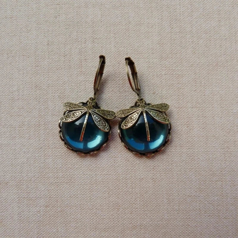 Pendientes de oro antiguo con libélula
