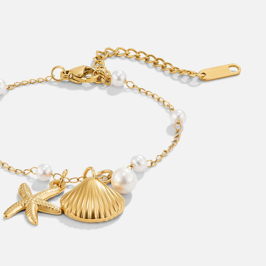 Pulsera con colgantes en forma de concha