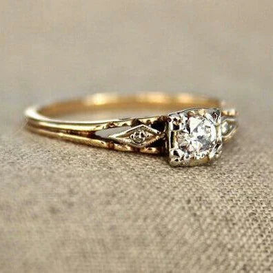 Anillo vintage de oro fino con circonita