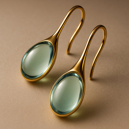 Pendientes de cristal elegantes en forma de gota en oro y plata