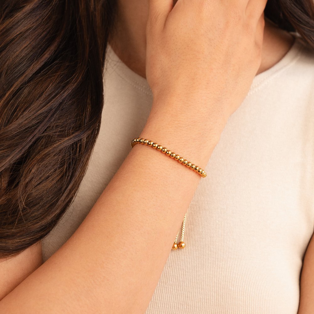 Pulsera de oro con perlas