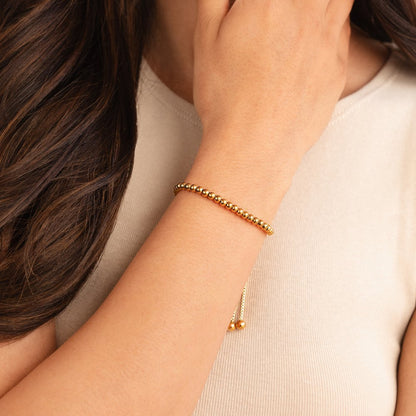 Pulsera de oro con perlas