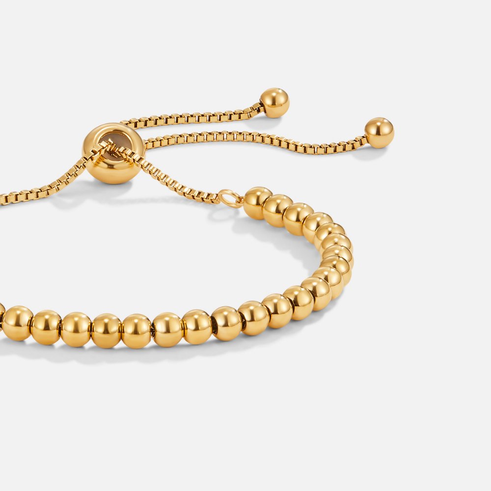 Pulsera de oro con perlas