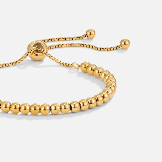 Pulsera de oro con perlas
