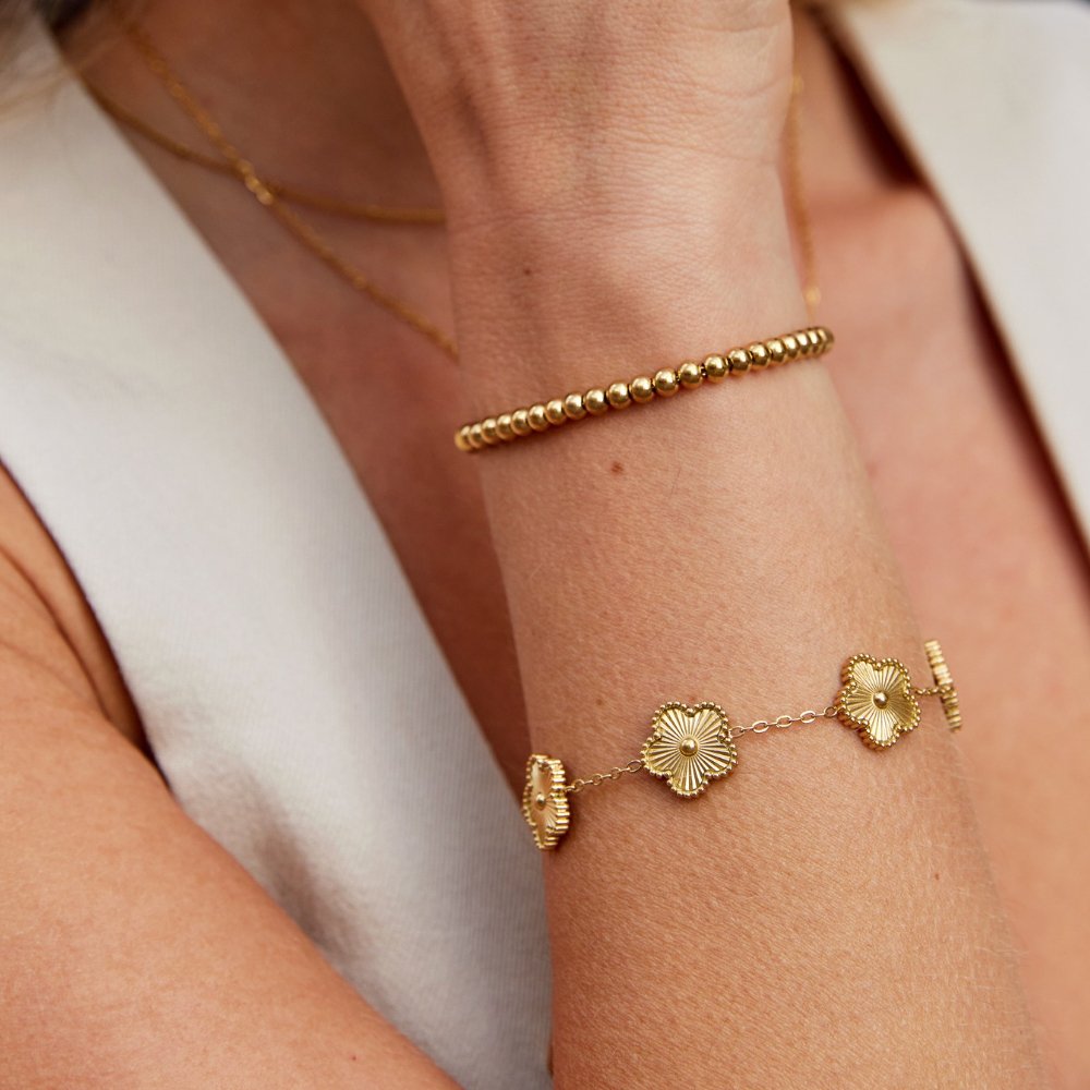 Pulsera de oro con perlas