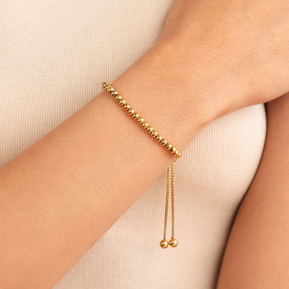 Pulsera de oro con perlas